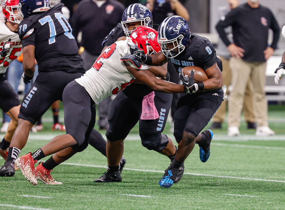 Boden Walker (0) was a load for the Savannah Christian defense to handle in Wednesday GHSA Class 3A championship game. The junior rushed for 129-yards and two touchdowns in the win.